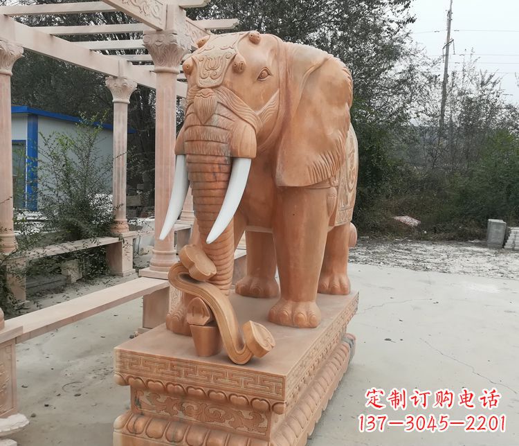 常州鼻卷如意的大象晚霞红门口镇宅石雕
