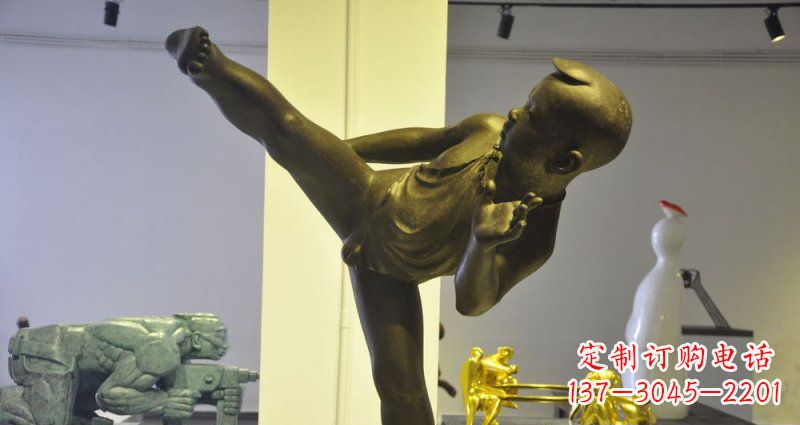 常州领雕塑男孩练功夫铜雕