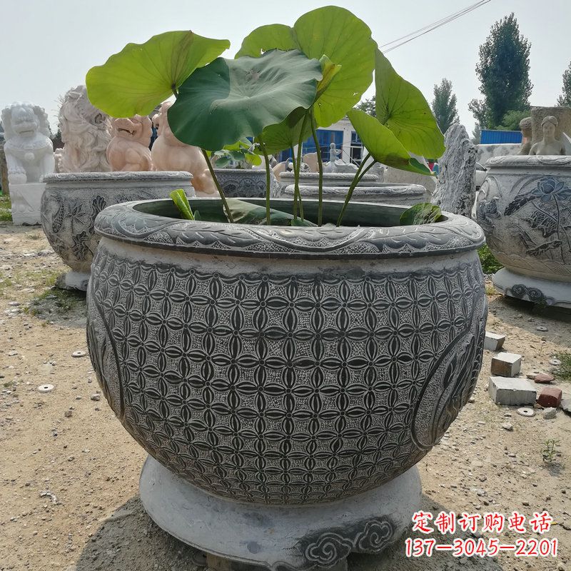 常州荷花鱼石雕塑,精美雕塑展现浪漫情怀