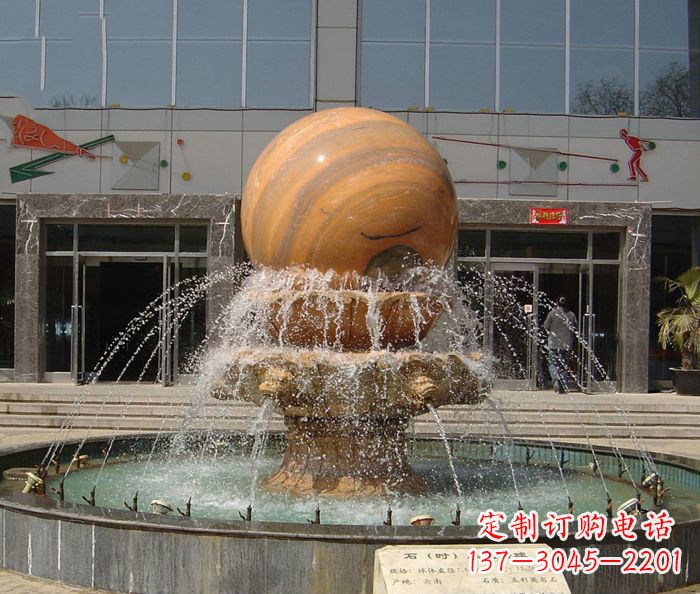 常州石来运转球晚霞红风水球石雕