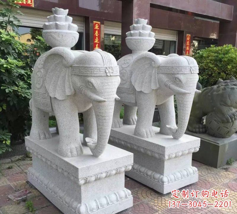 常州驮元宝的大象石雕