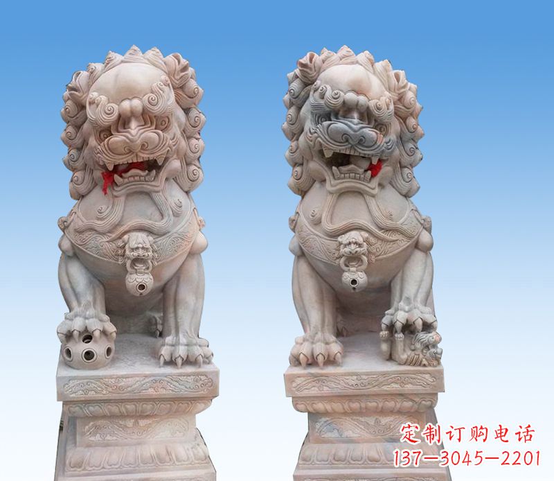常州晚霞红踩球狮子石雕