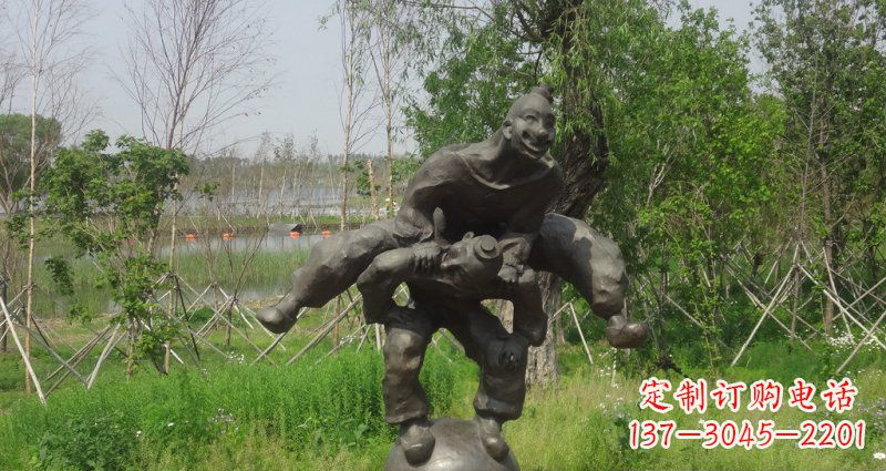 常州园林站在球上面跳山羊的人物景观铜雕